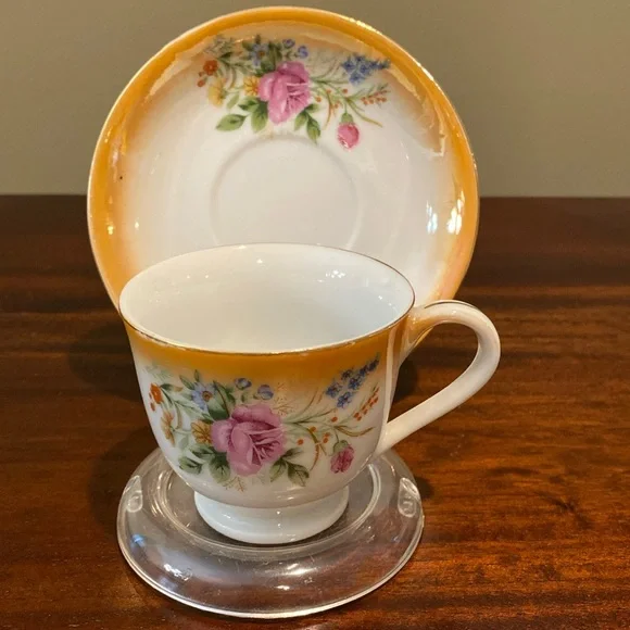 Vintage orange floral teacup and saucer set. - Picture 1 of 11